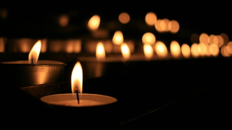 lit candles in the dark