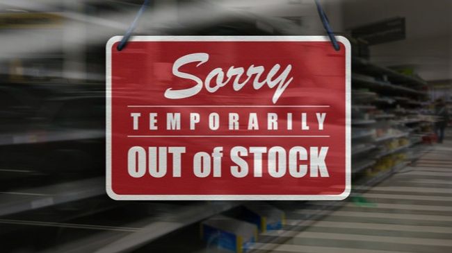 out of stock sign in red on small business storefront window