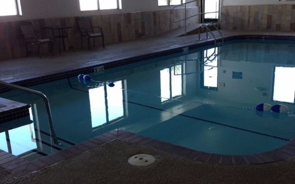 Heated swimming pool  by Wingate by Wyndham Bentonville Airport