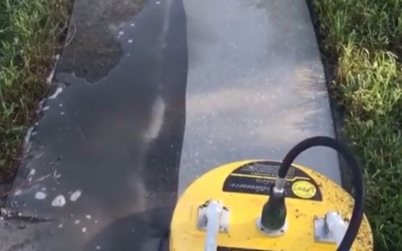 Concrete cleaning  by Ricks Quality Pressure Washing