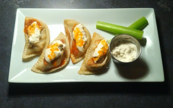 We have a mix of homemade comfort food, especially PIEROGIS!  by The Black Cat Tavern on 12th