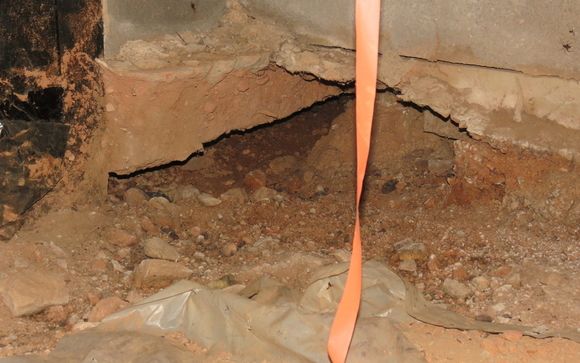 Hole under foundation by Heritage Inspections,LLC