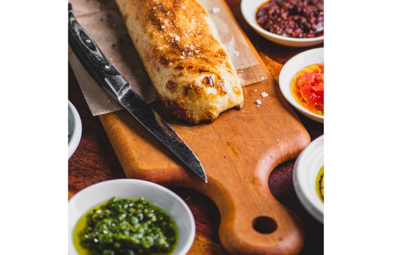 HOUSEMADE TABOON BREAD IS BAKED IN SPECIAL BUILD IN OVEN  by Bustan NYC