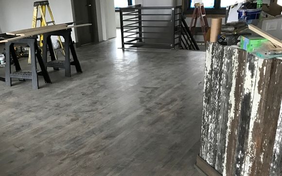 Newly constructed home with solid core laminate by Choice Floors/BTK Installation
