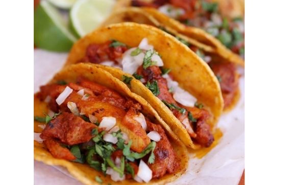 Authentic Tacos Al pastor  by Buho's Mexican Restaurant