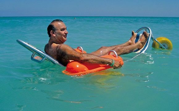 Floating Beach Wheelchair: Mobi-Chair by MOBILITY ON WHEELS LLC