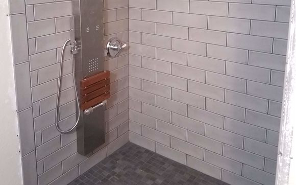 Tile Showers and floors  by Edwards Family Construction LLC