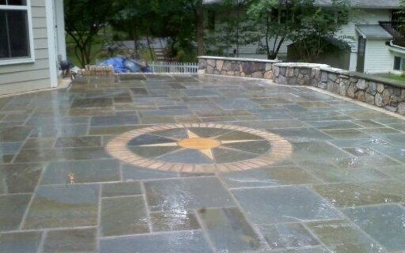 Outdoor patio, walkway and living space by MCP Chimney & Masonry, Inc.