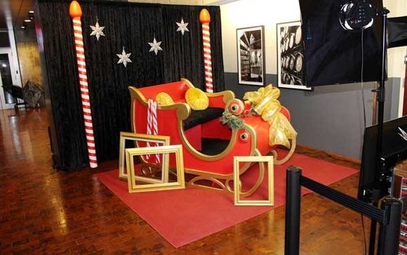 Holiday or Christmas corporate and private party photo booth and photo shoot services. by The Looking Glass Photo Booths