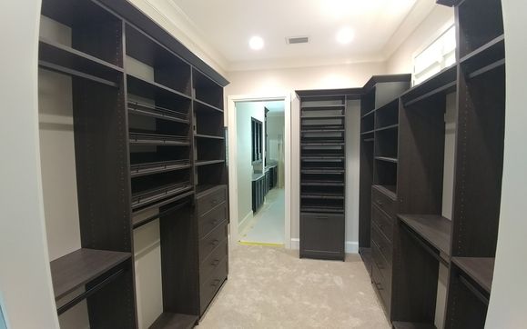Closet systems by Fusion cabinets, inc.