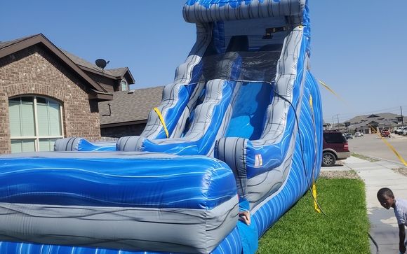 Water slides  by Mdg Party Rentals