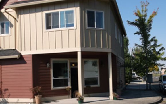 Two toned building by Battle Ground Apothecary & Natural Goods LLC