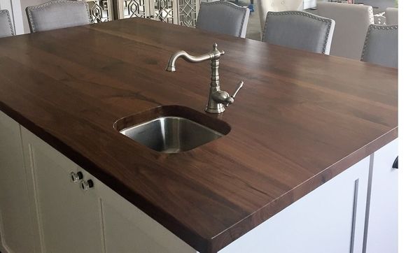 Cabinet doors, drawer fronts, and countertops by Superior Hardwoods