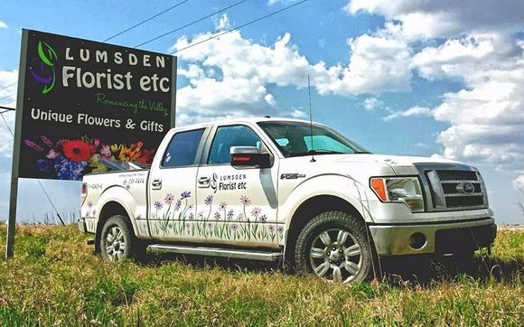 delivery by Lumsden Florist etc.