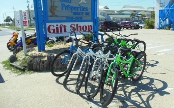 Bike and Scooter Rentals by Boardwalk Gift Shop in Navarre, FL - EyJiDWNrZXQiOiJhbGlnbmFibGV3ZWItcHJvZHVjDGlvbiIsImtleSI6InNlcnZpY2VzL3BpY3R1cmVzL21lZGl1bS8yMTM0OS8xNDQ1NjQ1OTg4X3VuZGVmaW5lZCIsImVkaXRzIjp7fX0=