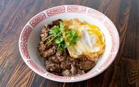 Garlic Black Pepper & Fried Egg on Rice by Tuk Tuk Thai