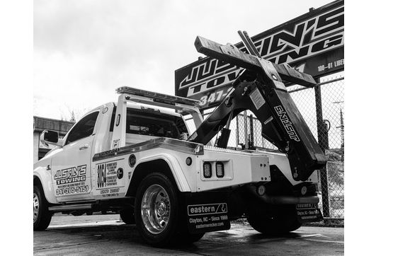 Towing services by Justins Towing & Storage Inc