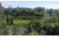 Land Real Estate by Modern Living Realty