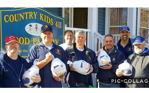Thanksgiving turkey and fixing distribution by Country Kids Food Pantry