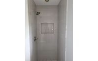 Tub & Shower Tiles and Installation by MLP Contracting and Building Inc