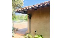 1/2 round seamless gutter with leader box and round spout. by Andy’s Rain Gutters