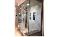 Natural stone shower by NuWay Floors & Interiors