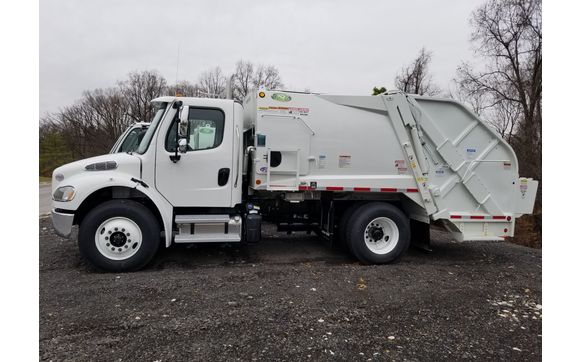 Ampliroll Hook Lifts and Roll Off Hoists. New Way refuse bodys and Brush Hawg Grapple loaders. by Maryland Industrial Trucks, Inc.
