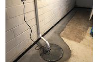 Interior Drain Tile Sump Pump System  by Affordable Egress Windows & Basement Waterproofing INC