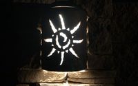 Ancient Sun on Austin stone by Southwest Ceramic Lighting