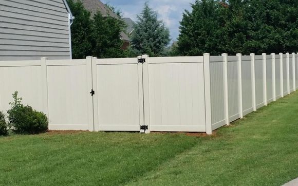 Homeland Wodgrain Vinyl Fence by Big Sun Fencing, Inc. in Ocala, FL ...