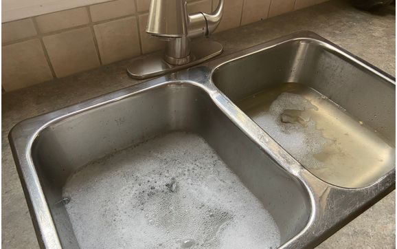Plugged kitchen sink by Sewer Specialist