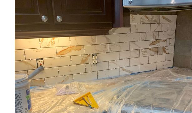 Tile backsplash  by Charles West Handyman LLC.