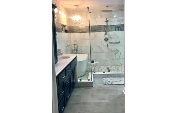 Bathroom Remodeling by On Top of It Roofing and Construction