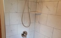 Tub & Shower Tiles and Installation by Midwest House Rehab, LLC