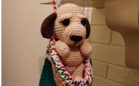 Scooter dog is an Amigurumi (stuffed animal). by Paulette's Panoply