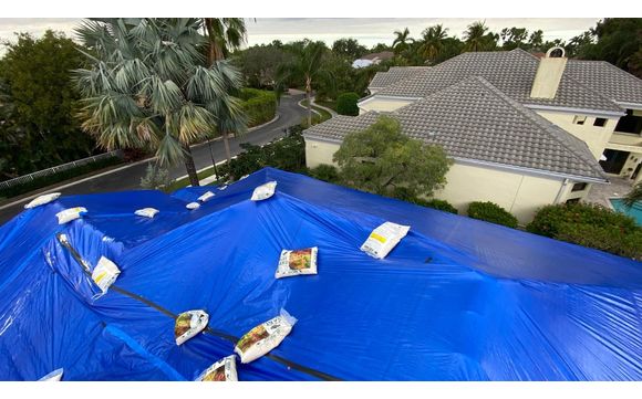 Roof Tarping by Moisture Guards Restoration