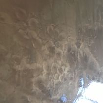 Home Additions metallic floor by Just Stain It INC