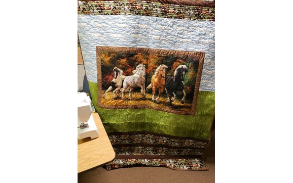 Custom quilts, mending, alterations, and dressmaking  by Susie's Quilting and Sewing