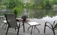 Quiet smokefree lakeside retreat for one couple by The Carriage House along Andrews Lake
