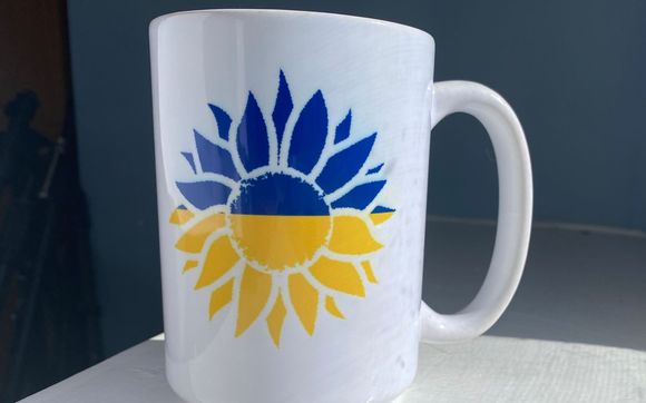 Customized mugs, glassware, door hangers and pillows by At Home and Beyond Co