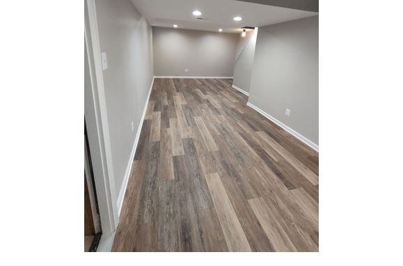 Laminate Flooring Installation by APM Group LLC. Construction