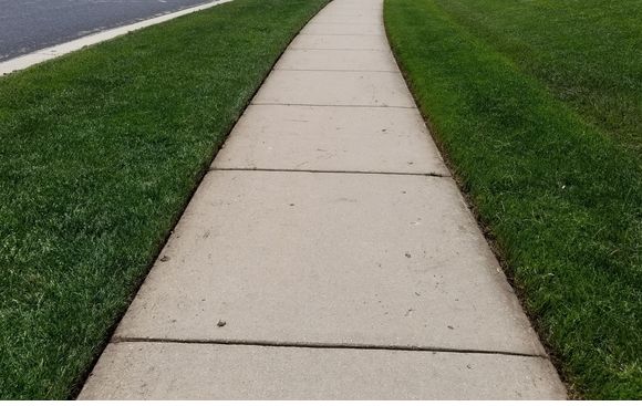 Sidewalk edging by Clear Cut Lawn Care in Mount Horeb WI Alignable