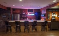 Basement & Attic Finishing by Distinctive Creations Inc.