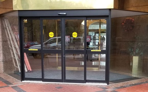 Automatic sliding doors  by Richmond Automatic Door LLC