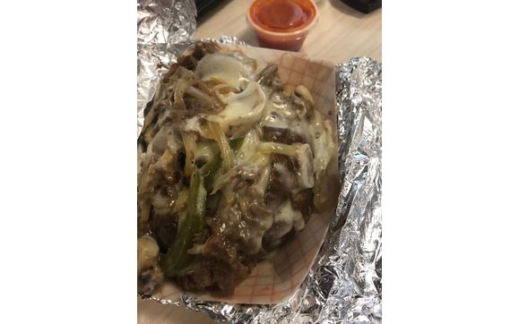 Philly Style Steak and Cheese Baked Potato by A & M's Heavenly Spuds