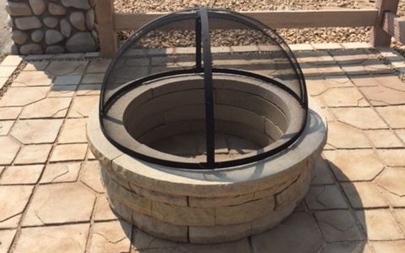 Stone Firepit by Signature Concrete Fence