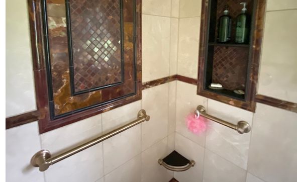 Tub & Shower Tiles and Installation by LA Stone and Kitchens