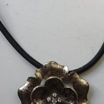 We sell necklaces, earrings and key chains made with cork by Jewels of Portugal