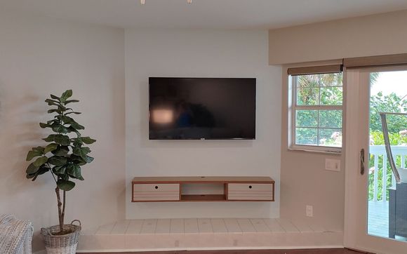 TV and Entertainment Center Installation by The Helpful HandyWoman