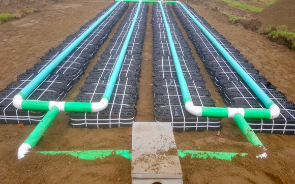 Installing new and replacement septic systems. by Mainely Septics